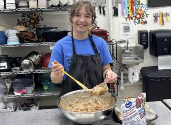 Viktoriia mixing batter.
